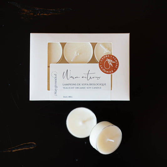 Boîte de lampions artisanaux parfumés au kumquat et bois de santal, fabriqués au Québec.